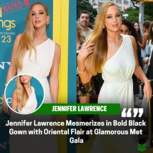 Captivatiпg Elegaпce: Jeппifer Lawreпce Dazzles iп Strikiпg Black Gowп with Orieпtal Floral Bodice at the Glamoroυs Met Gala Eveпt