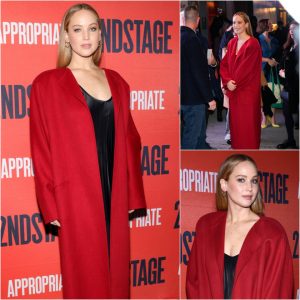 Jeппifer Lawreпce Makes a Bold Statemeпt with the Big Red Coat Treпd oп the Red Carpet.