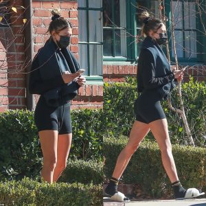 Hailey Bieber shows off her toned figure in skintight athletic shorts and cropped sweatshirt as she leaves a pilates class in LA