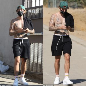 Justin Bieber turns up the heat as he puts his chiseled chest on display during hike in LA