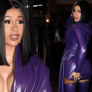 Cardi B puts on busty display in low-cut clinging purple leather mini dress as she steps out for Paris Fashion Week -News