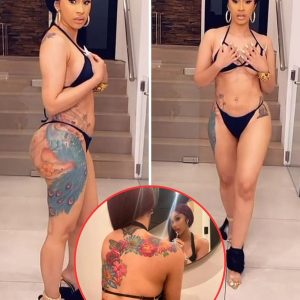 Cardi B shows off her curves in a black string bikini... and jokes about sucking in her stomach for sultry snaps-News