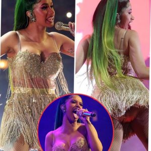 Cardi B puts on eye-popping display as she draws attention to ample behind in gold tasseled mini skirt and busty bra for Chicago concert -News